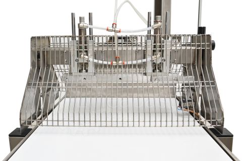 Bande transporteuse pour pâte longue avec coupe en guillotine