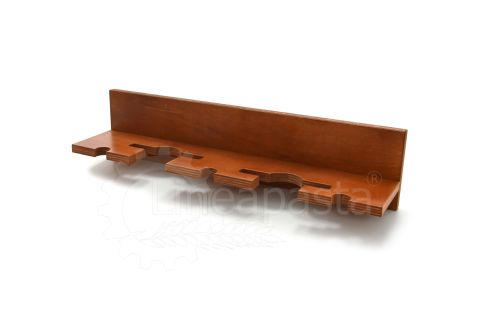 Wall support for three pizza peels and two pizza shovels